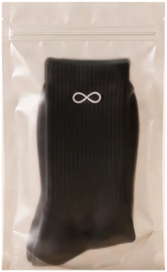 Infinity socks — black pair in a frosted zip pouch